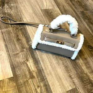Tan and white fluffy bag